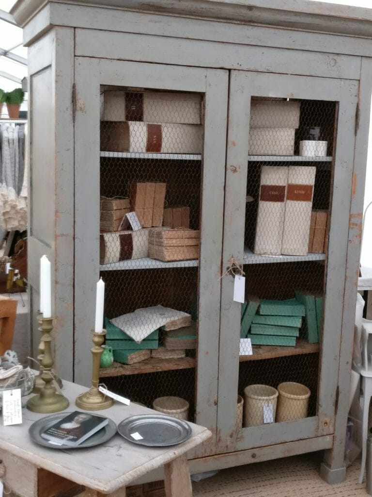 Tall Italian chicken wire fronted cupboard