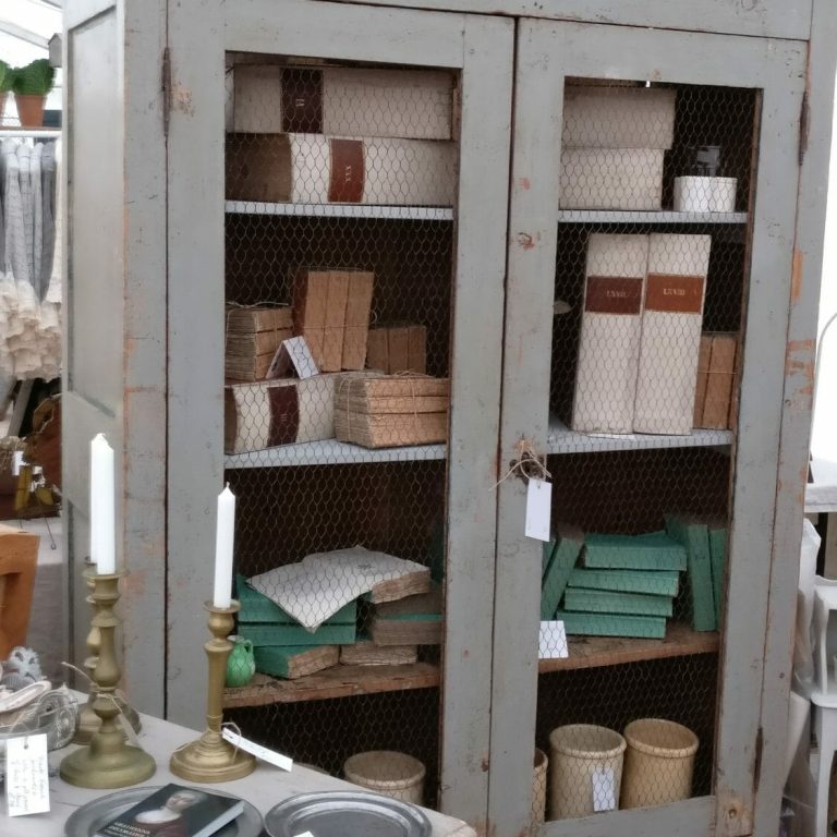 Tall Italian chicken wire fronted cupboard