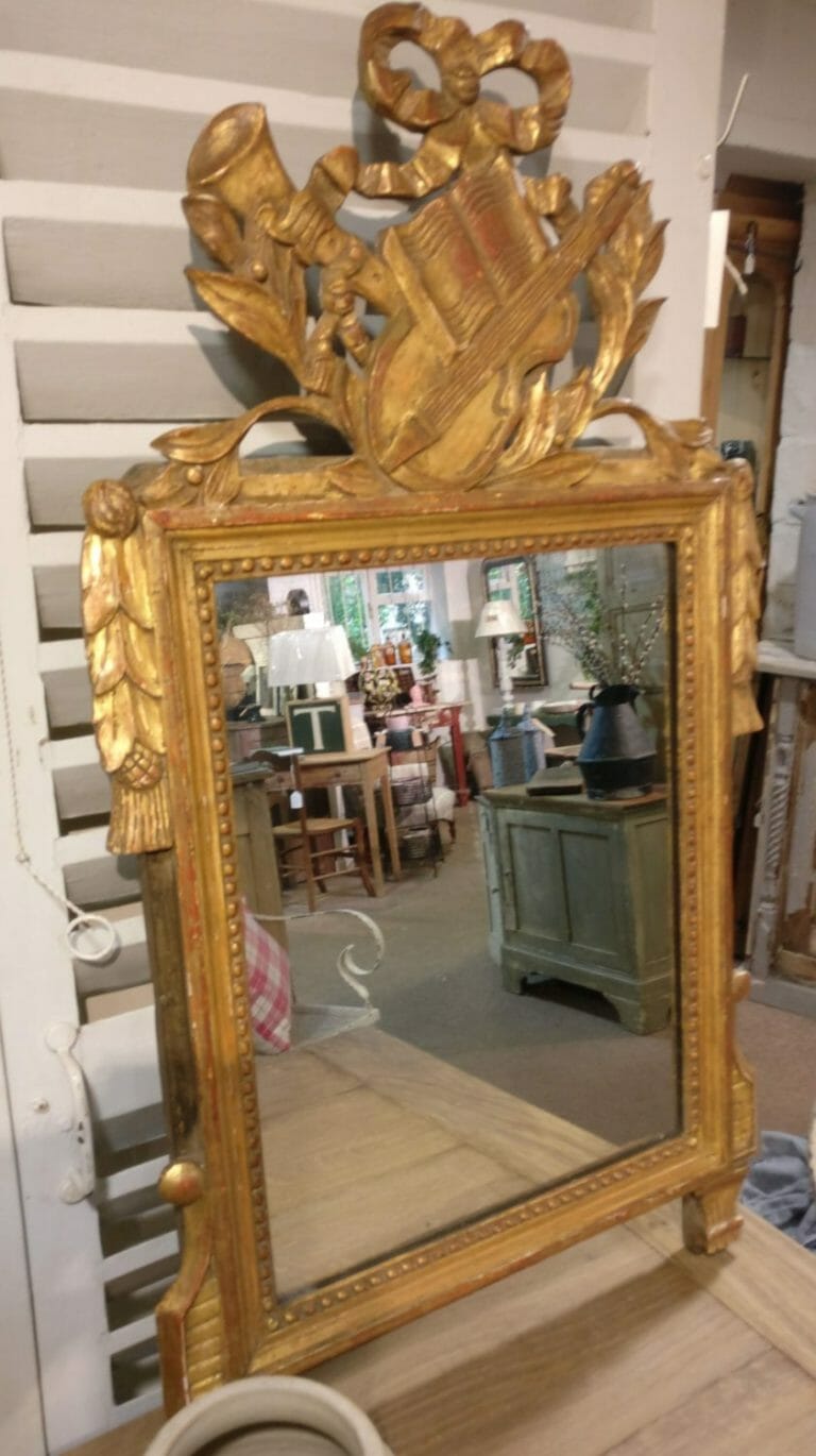 French gilded mirror with large fronton