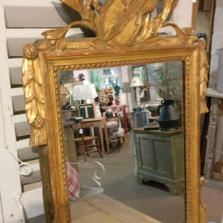 French gilded mirror with large fronton