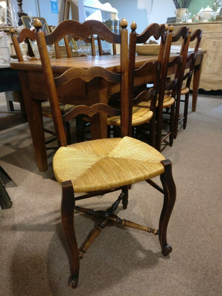 Eight Provencal rush seated chairs