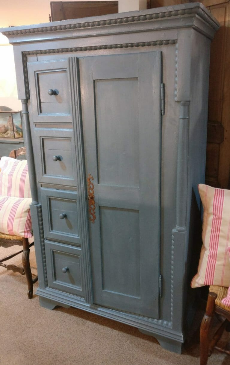 Tall cupboard with drawers