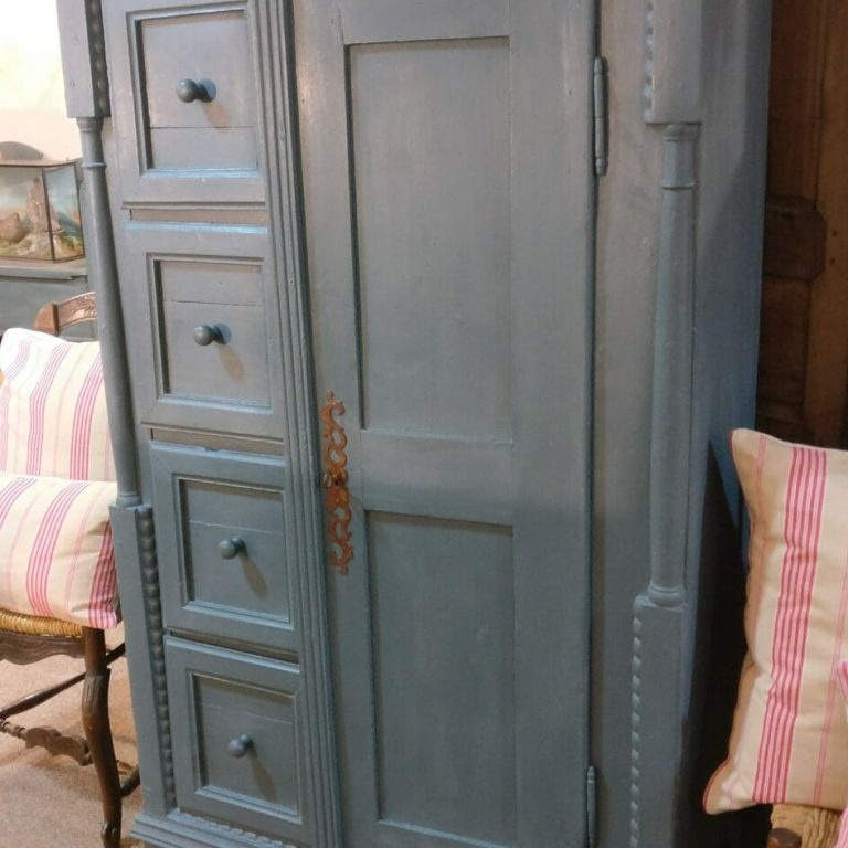 Tall cupboard with drawers