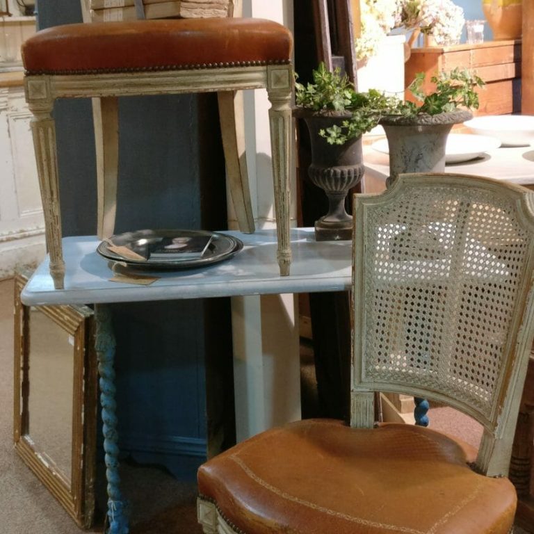 Pair of French cane back, leather seated chairs